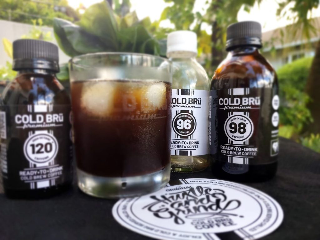 COLD BRü Artisanal Coffee bottles and glass
