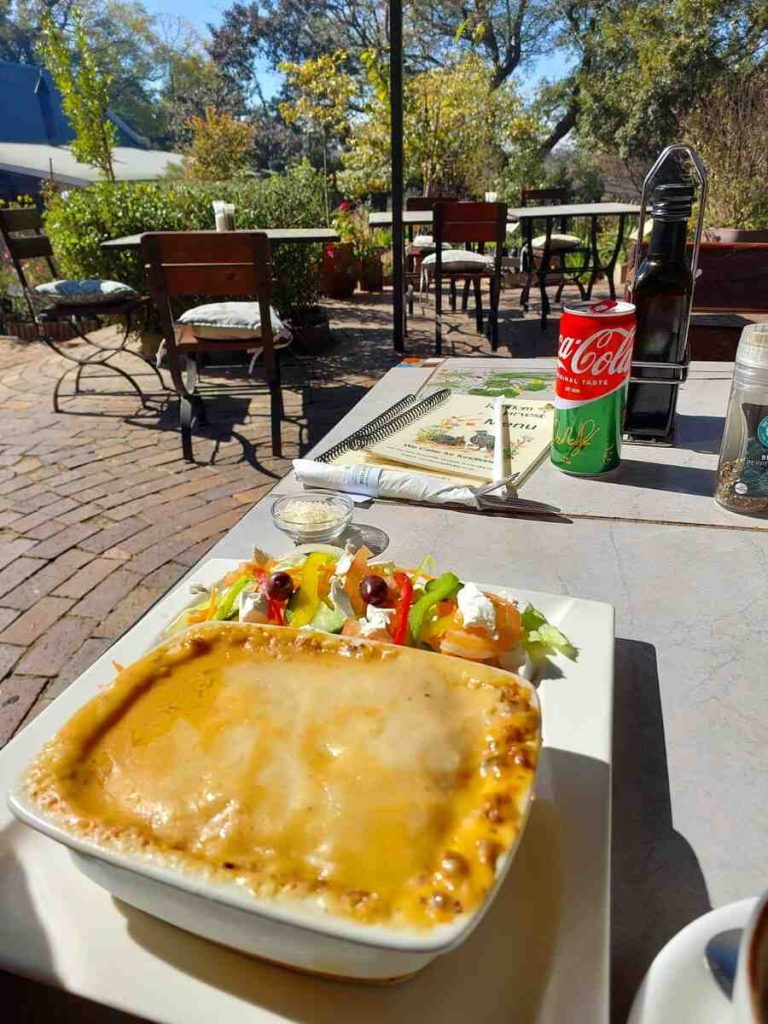 Enjoying a lasagne at Random Harvest Nursery's tea garden.